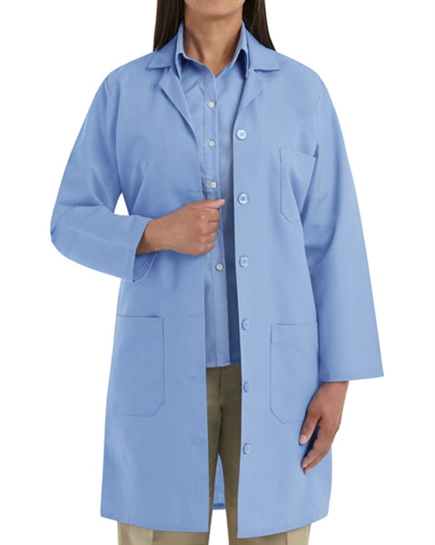 Front view of a woman in Red Kap Women's Light Blue Lab Coat.