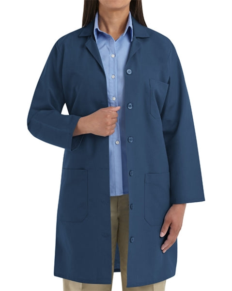 Front view of a woman wearing Red Kap Women's Navy Lab Coat.