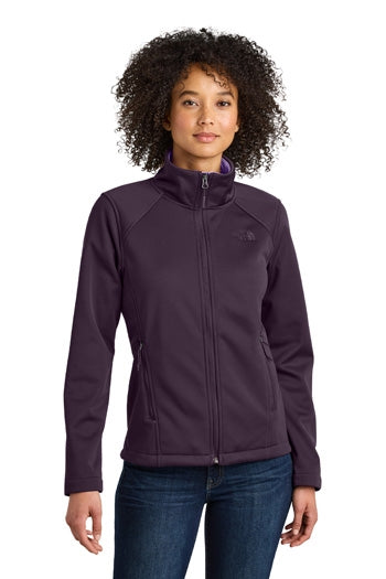 A front view of a woman wearing The North Face® Women's Chest Logo Ridgewall Soft Shell Jacket.