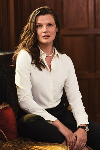A shot of a woman wearing Brooks Brothers Women’s Full-Button Satin Blouse.