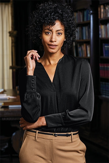 A shot of a woman wearing Brooks Brothers Women’s Open-Neck Satin Blouse.