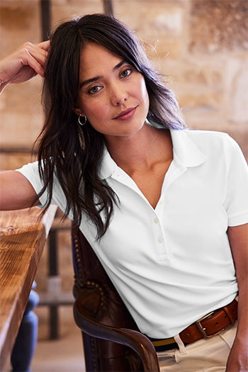 A shot of a woman wearing Brooks Brothers Women’s Pima Cotton Pique Polo.