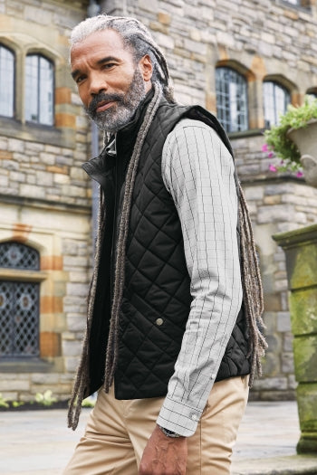 A shot of a man wearing Brooks Brothers Quilted Vest.