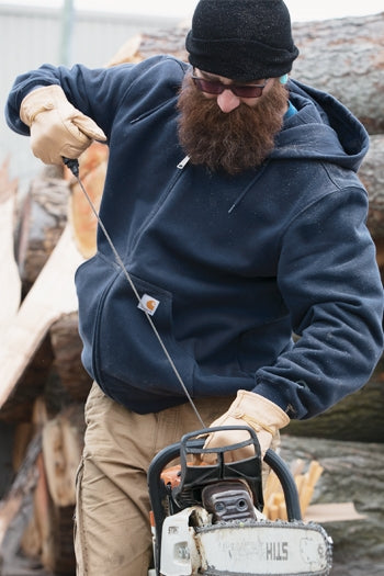 A shot of a man wearing Carhartt Rain Defender Paxton Heavyweight Hooded Zip-Front Sweatshirt.