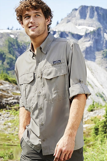 A shot of a man wearing Eddie Bauer Long Sleeve Performance Fishing Shirt.