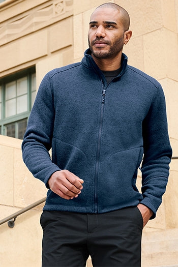 A shot of a man in Port Authority Arc Sweater Fleece Jacket.