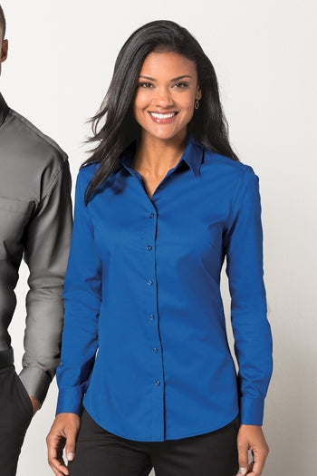 A front view of a woman wearing Port Authority Ladies SuperPro Twill Shirt.