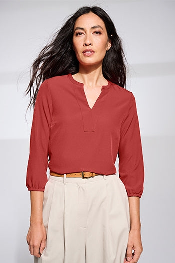 A shot of a woman wearing Mercer+Mettle® Women's Stretch Crepe 3/4-Sleeve Blouse.