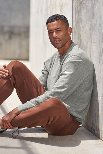 A shot of a man wearing Nike Club Fleece Crew.