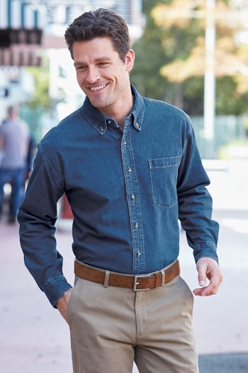 A shot of a man wearing Port Authority Heavyweight Denim Shirt.