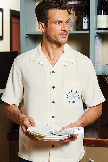 A photo of a man wearing Port Authority - Easy Care Camp Shirt.