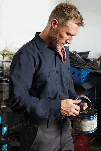 A photo of a man wearing Red Kap Long Sleeve Industrial Work Shirt.