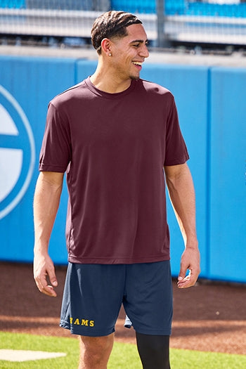 A shot of a man wearing Sport-Tek Competitor™ 7" Short.