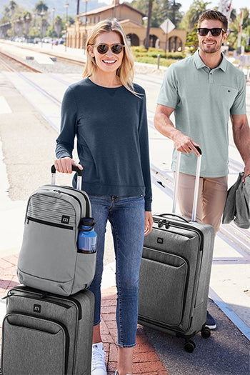 TravisMathew - Quad Carry-On Spinner. TMB400