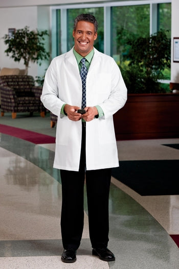 A shot of a man wearing White Swan META Fundamentals 38" Men's Lab Coat.