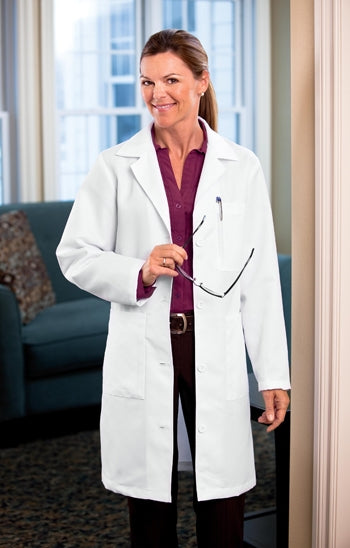 A shot of a woman wearing White Swan META Ladies' 37" Twill Lab Coat.